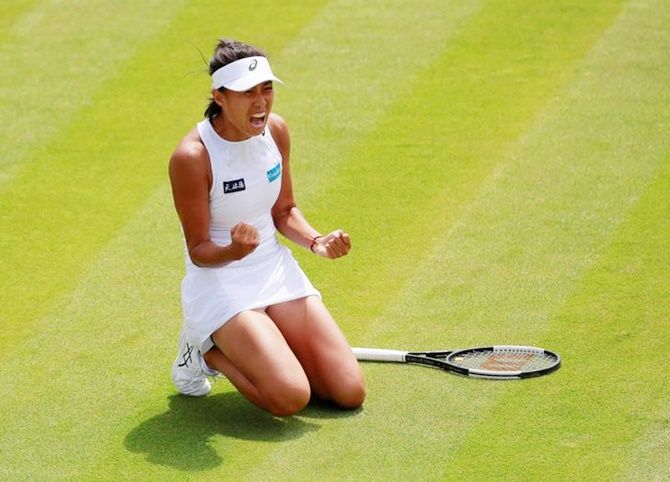 China's Zhang Shuai celebrates winning her third round match against Denmark's Caroline Wozniacki.