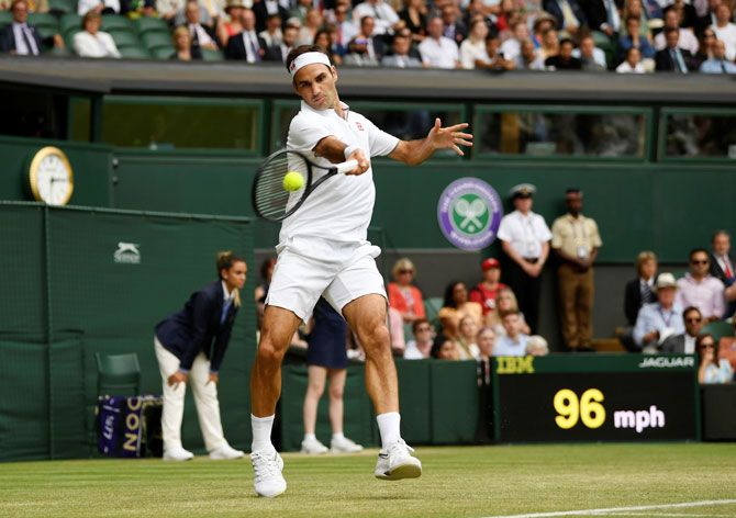 Roger Federer during his match against Frenchman Lucas Pouille, which he won 7-5, 6-2, 7-6(4). Federer became the first player -- man or woman -- to notch up 350 Grand Slam match wins. Photograph: Tony O'Brien/Reuters