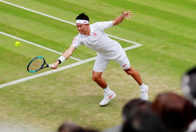Japan's Kei Nishikori in action during his third round match against USA's Steve Johnson