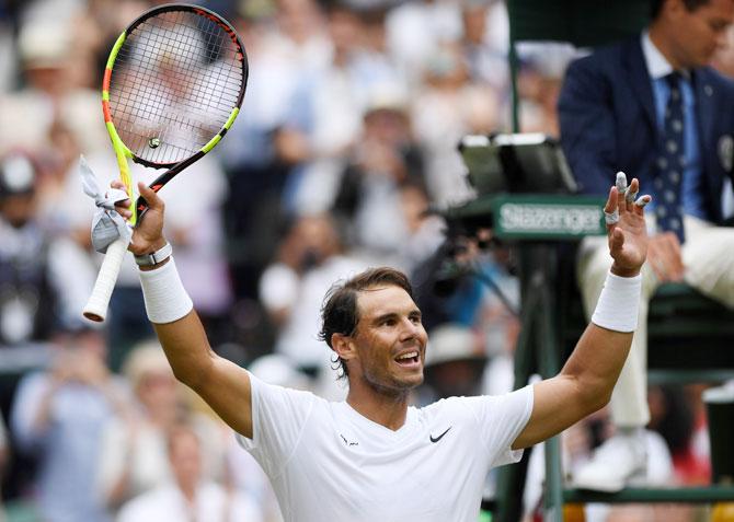 Spain's Rafael Nadal celebrates winning his third round match against France's Jo-Wilfried Tsonga