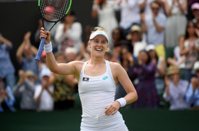 Alison Riske celebrates her win in the fourth round match against Ashleigh Barty