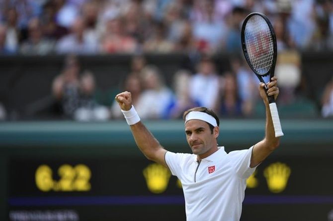 Switzerland's Roger Federer celebrates after winning his quarter-final against Japan's Kei Nishikori