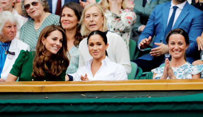 Britain's Catherine, Duchess of Cambridge, with Meghan, Duchess of Sussex, and Pippa Middleton in the Royal Box ahead of the final between Serena Williams and Simona Halep