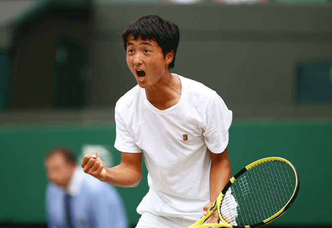 Japan's Shintaro Mochizuki reacts during the Wimbledon boys' singles final against Spain's Carlos Gimeno Valero 