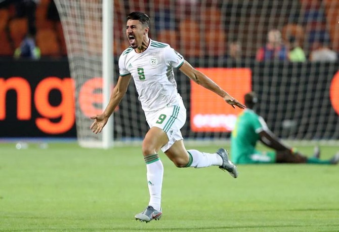Baghdad Bounedjah celebrates scoring early for Algeria in the Africa Cup of Nations 2019 final against Senegal.