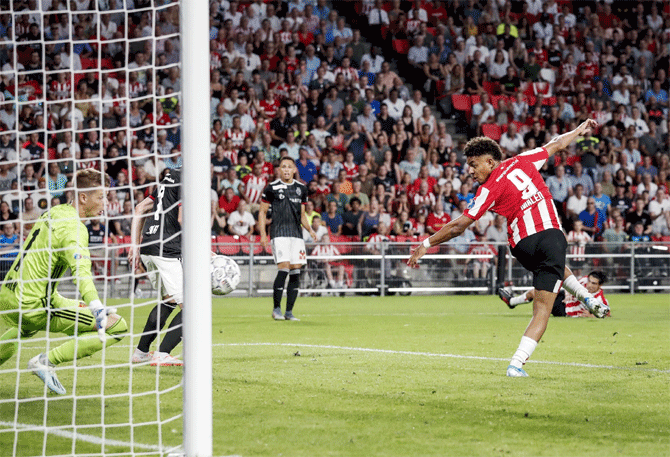 PSV Eindhoven's Donyell Malen scores during the Champions League qualifier against Basel on Tuesday