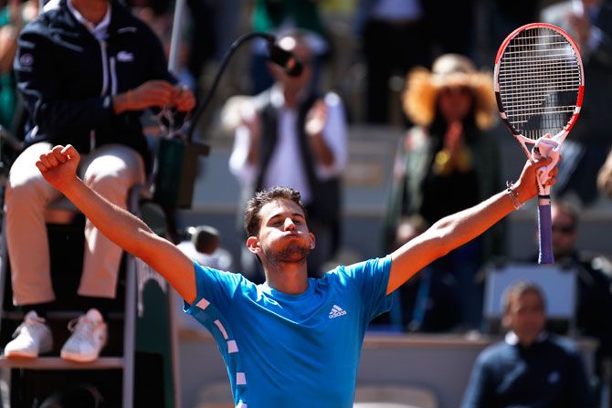 Austria's Dominic Thiem celebrates after beating Serbia's Novak Djokovic his French Open semi-final at Roland Garros on Saturday