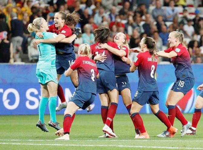 Norway's players celebrate after winning the match