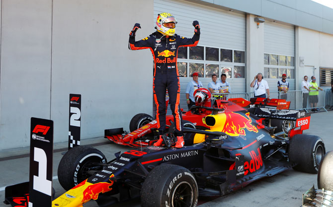 Red Bull's Max Verstappen celebrates after winning the Austrian F1 Grand Prix at Red Bull Ring in Spielberg, Austria on Sunday