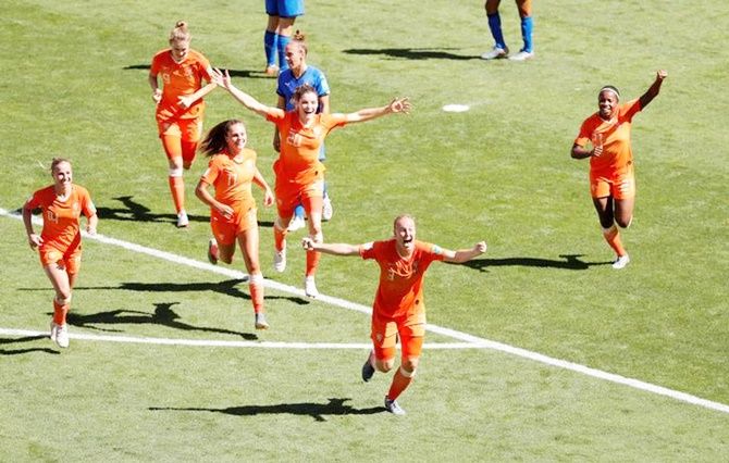 Stefanie van der Gragt celebrates The Netherlands' second goal with team mates.