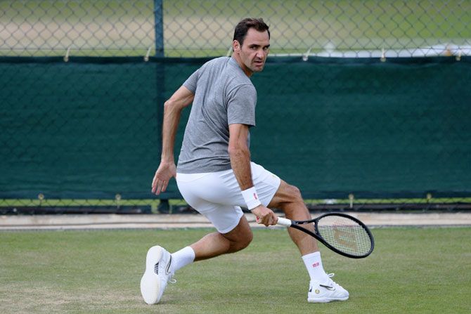 Switzerland's Roger Federer plays a backhand during a practice session ahead of The Wimbledon  Championships 2019 at the All England Lawn Tennis and Croquet Club in London, England, on Sunday