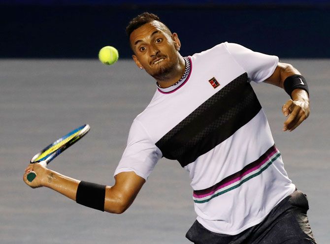 Australia’s Nick Kyrgios plays a return during his semi-final match against USA's John Isner in  Acapulco in Mexico on Friday