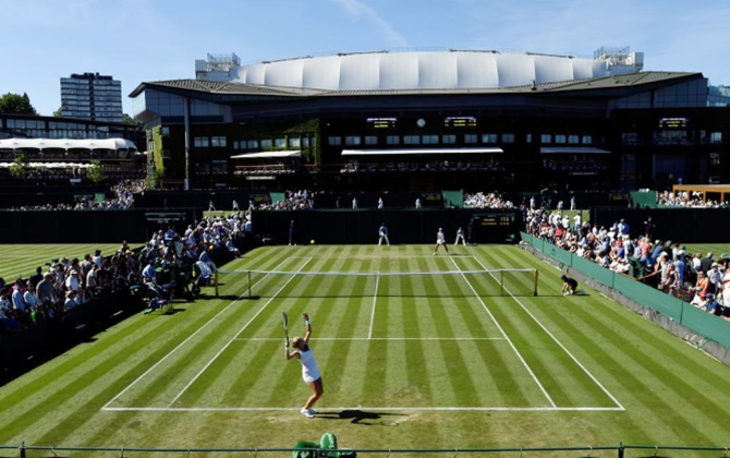 Wimbledon defends ban on Russian, Belarusian players