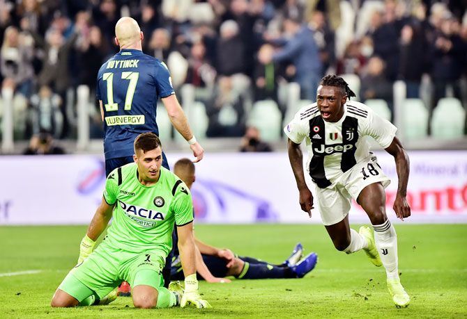 Juventus' Moise Kean celebrates scoring their first goal against Udinese in Turin, Italy on Friday