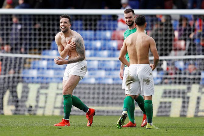 Brighton's Shane Duffy and Davy Propper celebrate after their win against Crystal Palace at Selhurst Park 