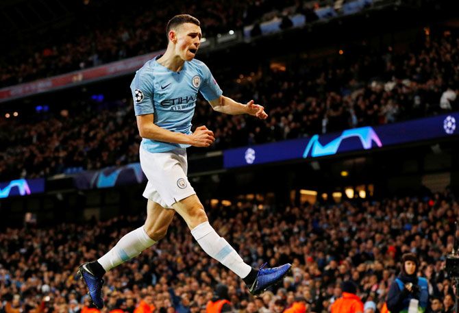 Manchester City's Phil Foden celebrates scoring their sixth goal against Schalke 04 during their Champions League, round of 16 second leg match at Etihad Stadium in Manchester