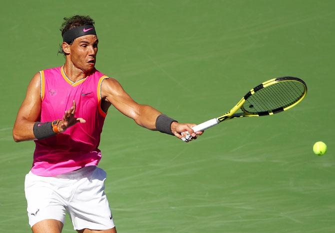 Spain's Rafael Nadal plays a forehand return against Argentina's Diego Schwartzman during their men's singles third round match