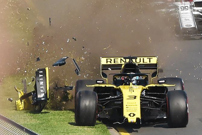 Renault's Daniel Ricciardo crashes at the start of the Australian F1 Grand Prix at the Albert Park Grand Prix Circuit in Melbourne, Australia on Sunday