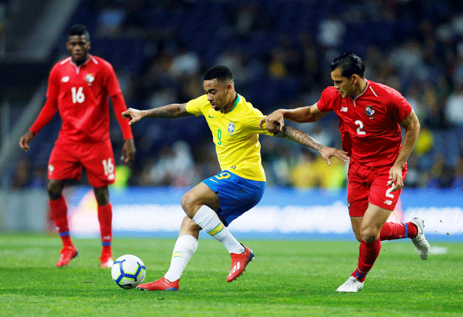 Brazil's Gabriel Jesus is challenged by Panama's Jan Vargas during their international friendly at Estadio do Dragao in Porto, Portugal, on Saturday