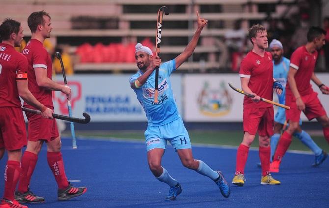 Mandeep Singh celebrates