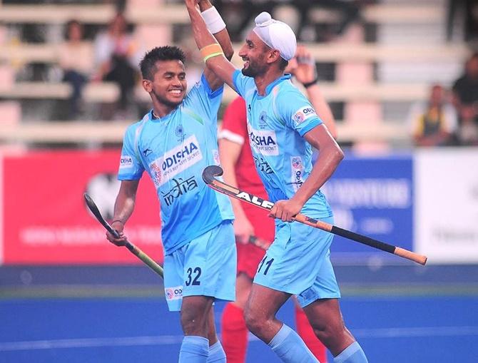 Mandeep Singh celebrates