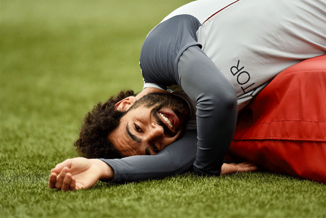 Mohamed Salah enjoys a light moment during a Liverpool FC training session
