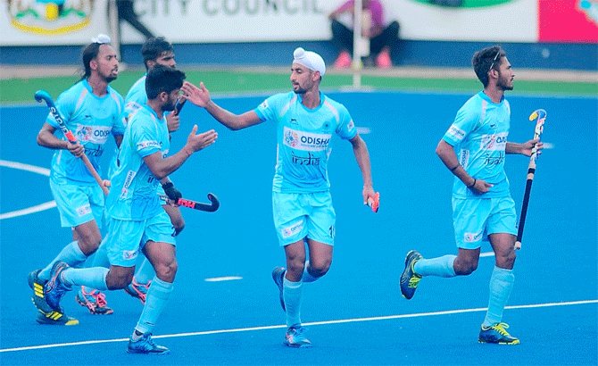 India players celebrate a goal against Poland in their Azlan Shah Cup match on Friday