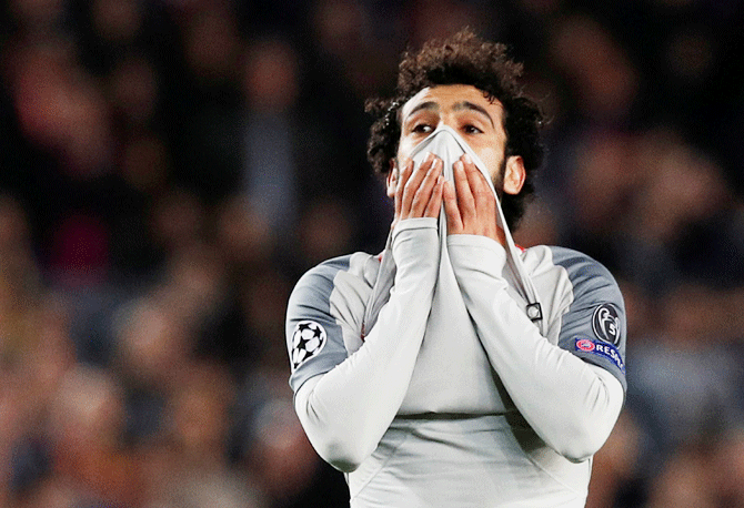  Liverpool's Mohamed Salah looks dejected on missing a scoring opportunity against Barcelona on Wednesday