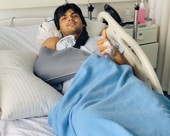 Neeraj Chopra gives a thumbs up after his surgery.