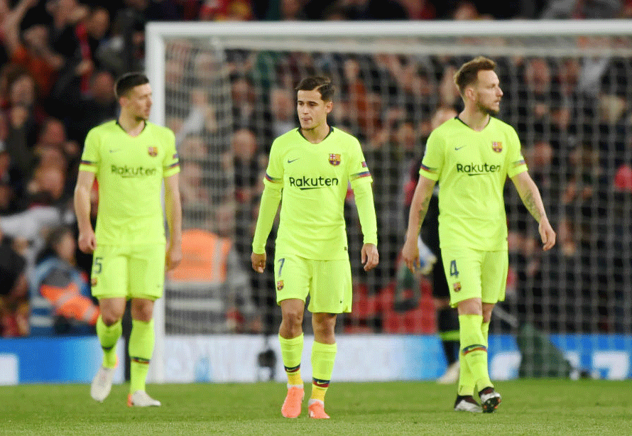 Barcelona's Philippe Coutinho and Ivan Rakitic wear a dejected look during their UEFA Champions League semi-final second leg match against Liverpool at Anfield in Liverpool, England, on Tuesday