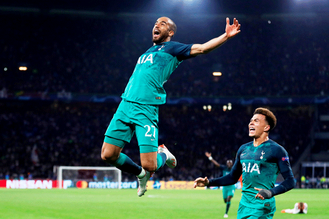 Tottenham's Lucas Moura celebrates with Dele Alli after scoring their third goal against Ajax to complete his hat-trick