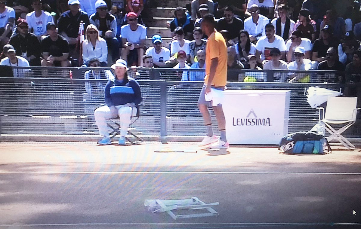 Nick Kyrgios reacts after throwing a chair onto the court during his match against Norway's Casper Ruud on Thursday