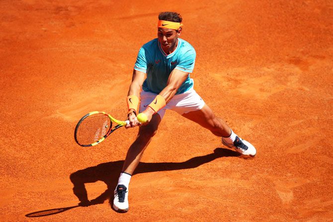 Spain's Rafael Nadal plays a backhand against France's Jeremy Chardy in their second round match