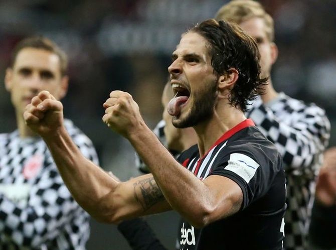Goncalo Paciencia, who scored Frankfurt's fifth goal, celebrates at the end of the match.