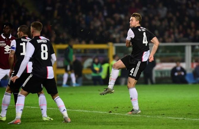Matthijs de Ligt celebrates scoring for Juventus.