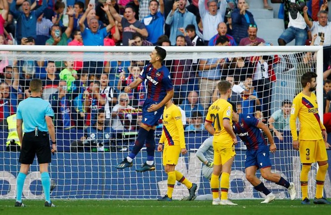 Nemanja Radoja celebrates scoring Levante's third goal.