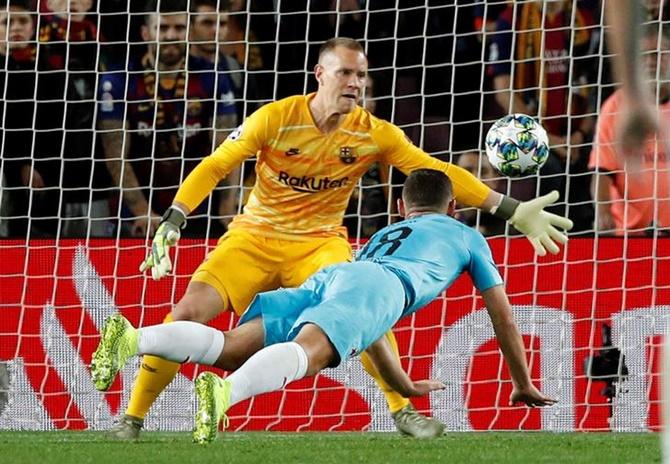 Barcelona goalkeeper Marc-Andre ter Stegen makes a save off Slavia Prague's Jan Boril.