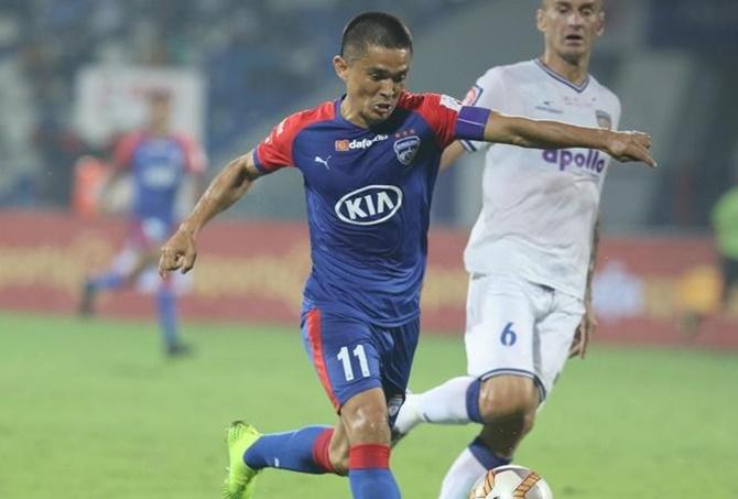 Sunil Chhetri unleashes a rasping drive to score Bengaluru’s second goal against Chennaiyin in Sunday’s ISL match in Bengaluru