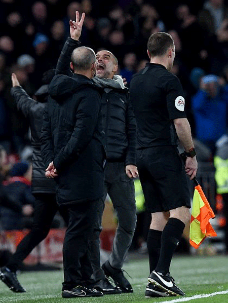 Manchester City manager Pep Guardiola's chuckle-inducing reaction after being denied second penalty after a handball during the English Premier League match between City and Liverpool at Anfield on Sunday