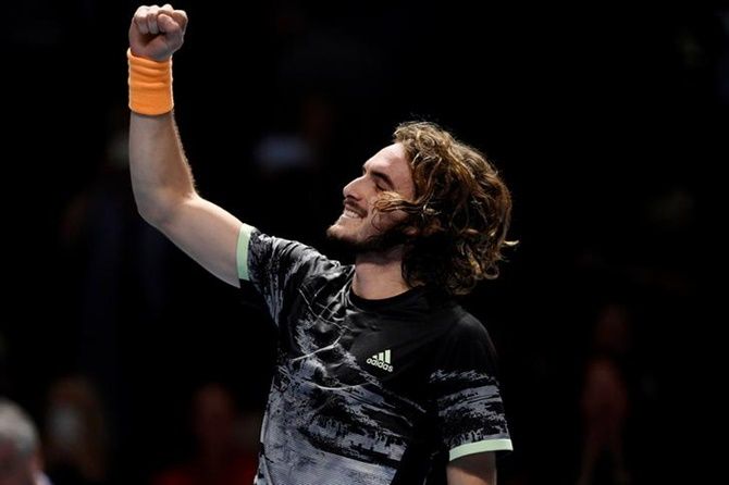 Greece's Stefanos Tsitsipas celebrates winning his ATP Finals group stage match against Germany's Alexander Zverev