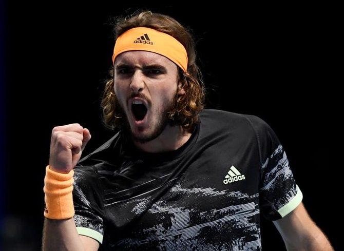Greece's Stefanos Tsitsipas reacts during his group stage match against Spain's Rafael Nadal
