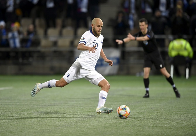 Teemu Pukki shoots from the penalty spot to give Finland a 2-0 lead.