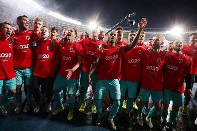 Austria's players celebrate qualifying for Euro 2020.