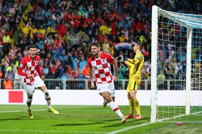 Bruno Petkovic celebrates scoring Croatia's second goal against Slovakia.