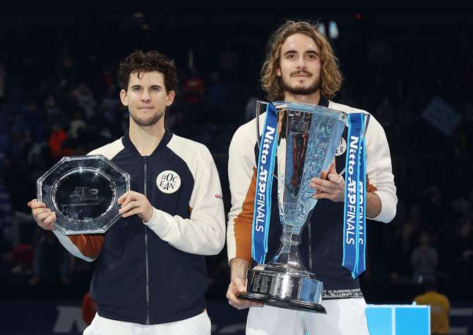 Greece's Stefanos Tsitsipas (right) beat Austria's Dominic Thiem to win the final of the ATP Tour Finals The O2 Arena in London on Sunday