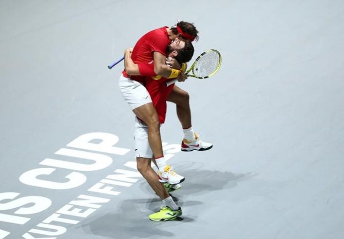 Rafael Nadal and Marcel Granollers-Pujol celebrate victory.