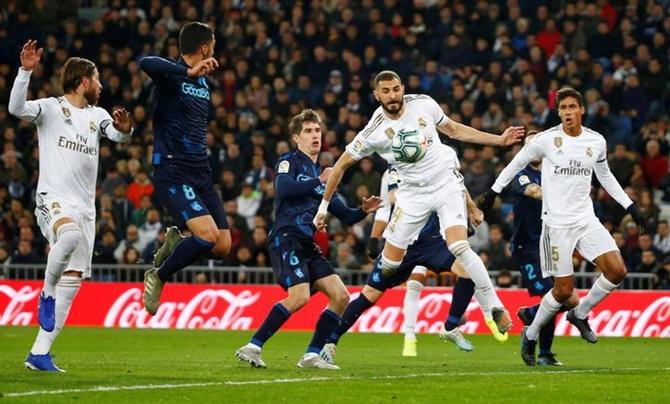 Karim Benzema scores Real Madrid's opening goal.