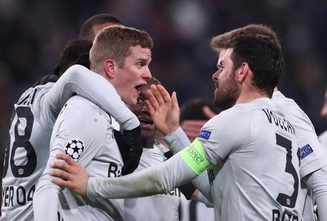 Sven Bender celebrates with teammates after scoring Bayer Leverkusen's second goal agaiknst Lokomotiv Moscow.