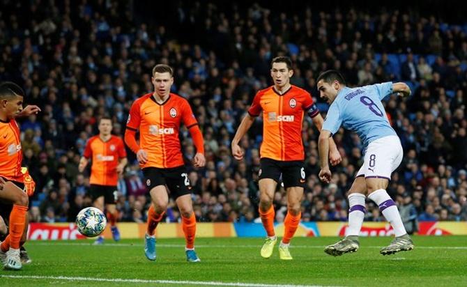 Ilkay Gundogan scores for Manchester City against Shakhtar Donetsk