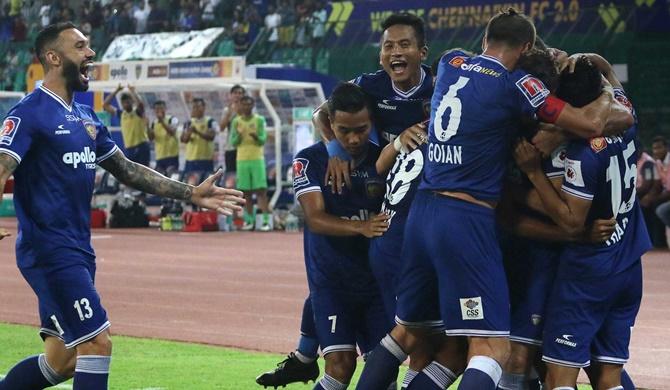 Chennaiyin FC players celebrate after scoring against Odisha FC 